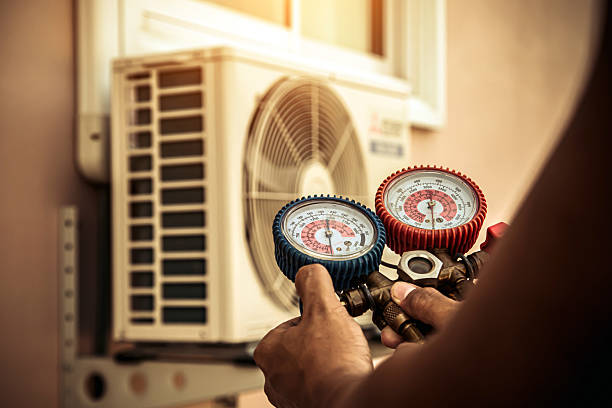 Professional Air Conditioning Service technician working in Merit, TX